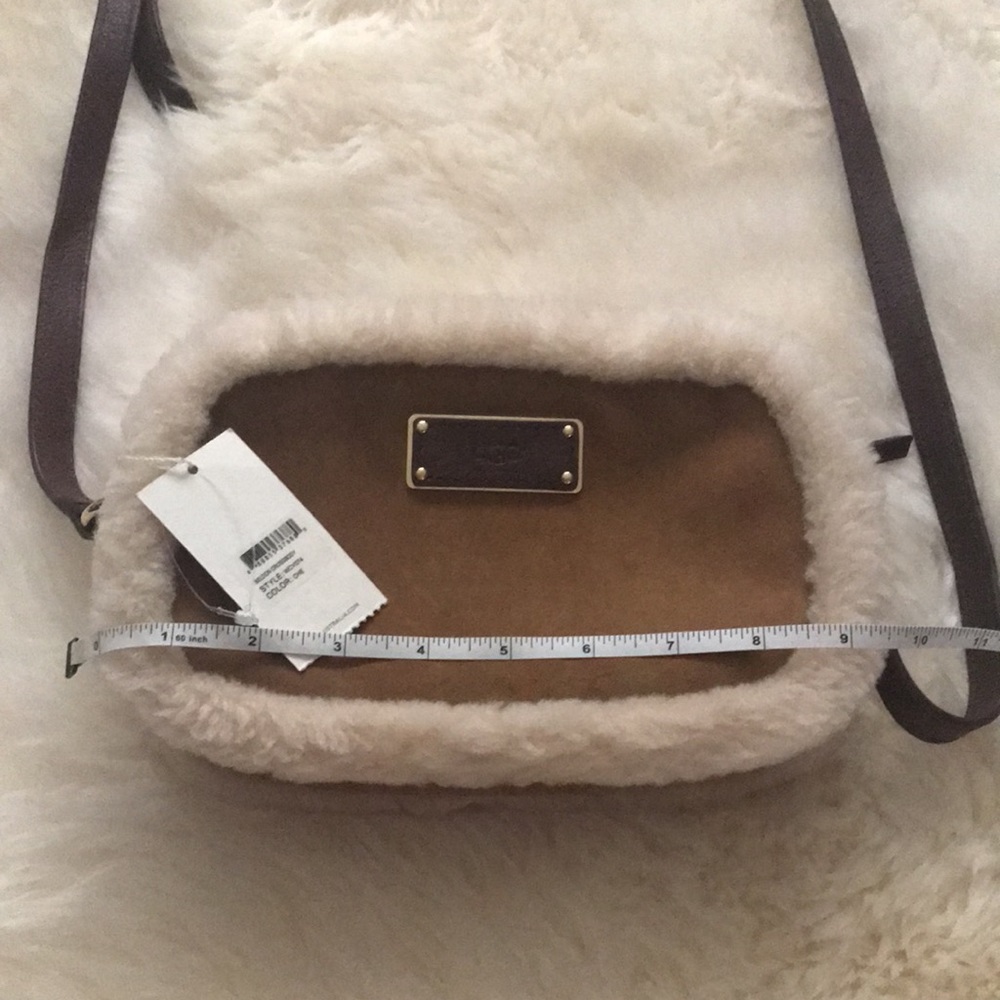 UGG Sheldon Crossbody has tags sheepskin suede 9.5 x 6.. flaws but never used - Picture 5 of 17